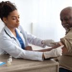 Woman receiving flu vaccine - Precision Clinical Research