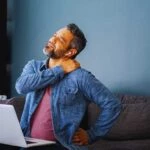Man - experiencing shoulder pain